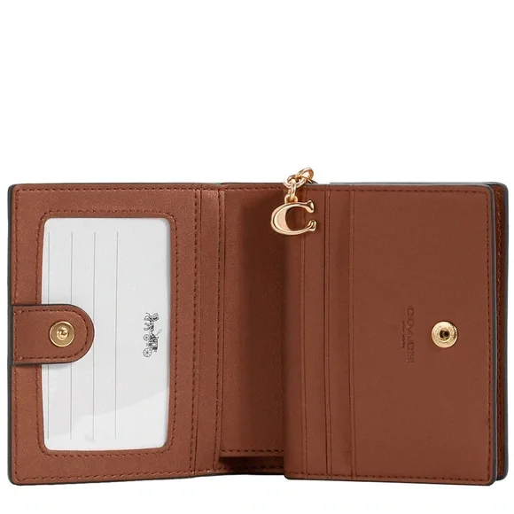 Coach Snap Wallet With Horse And Carriage Dot Print.
L: 4.25" W:1" H:3.5" - Picture 3 of 12